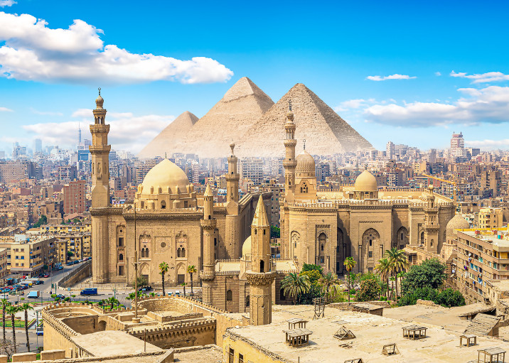 Cairo skyline and Pyramids of Giza with updated 2025 tourist safety guide