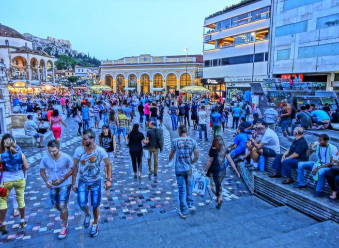 Crowded Monastiraki Square in Athens showing tourist safety tips and pickpocket hotspots in 2025