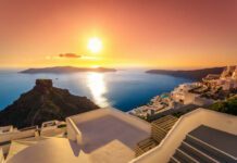 Best Time to Visit Santorini (2026 Guide) Santorini caldera view during sunset – best time to visit Santorini 2026